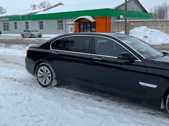 2013 BMW 7 серии Long 750Li xDrive V (F01/F02/F04) Рестайлинг, чёрный, 1750000 рублей - вид 5