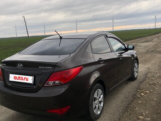 2015 Hyundai Solaris I Рестайлинг, коричневый, 905000 рублей, вид 2