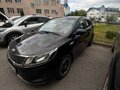 2014 Kia Rio III, чёрный - вид 3