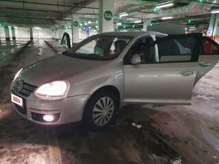 2010 Volkswagen Jetta V, серебристый, 950000 рублей, вид 3