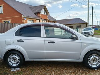 2010 Chevrolet Aveo I Рестайлинг, серебристый, 390000 рублей, вид 3