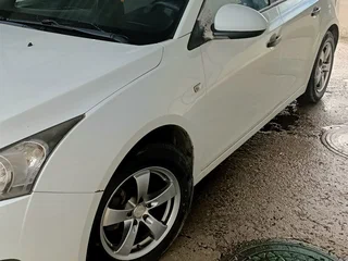 2012 Chevrolet Cruze I, белый, 430000 рублей, вид 1