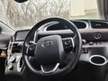 2017 Toyota Sienta II, коричневый, 1670000 рублей - вид 4