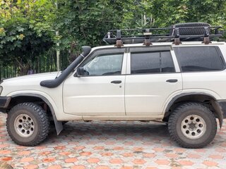2011 Nissan Patrol V (Y61) Рестайлинг, белый, 3000000 рублей, вид 3