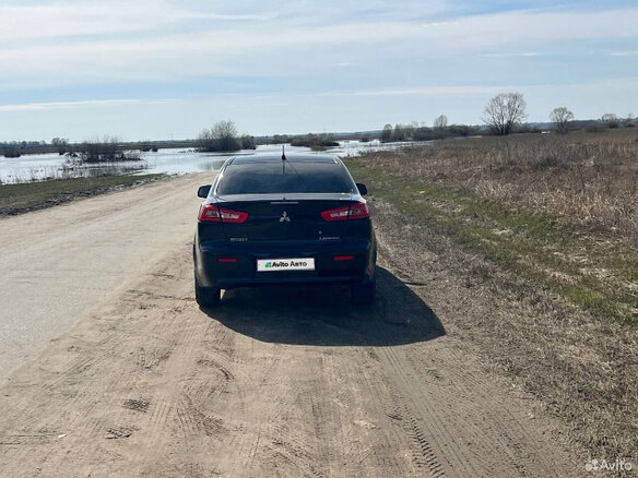 2008 Mitsubishi Lancer X, чёрный, 650000 рублей - вид 30