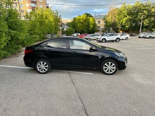 2012 Hyundai Solaris I, чёрный, 600000 рублей, вид 2