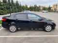 2012 Kia Rio 4-speed III, чёрный, 730000 рублей - вид 4