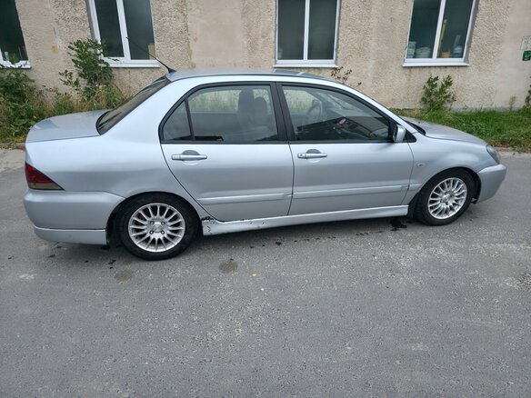 2004 Mitsubishi Lancer IX, серебристый, 335000 рублей - вид 1