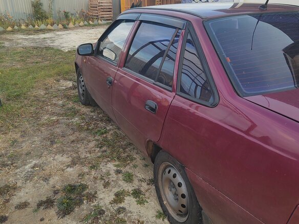 2009 Daewoo Nexia I Рестайлинг, пурпурный, 160000 рублей - вид 3