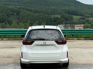 2023 Honda Fit IV Рестайлинг, белый, 1070007 рублей, вид 5