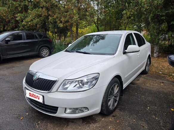 2011 Skoda Octavia II (A5) Рестайлинг, белый, 695000 рублей