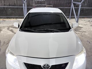 2009 Toyota Corolla X (E140, E150), белый, 780000 рублей, вид 3