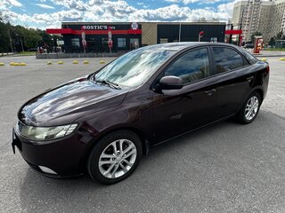 2010 Kia Cerato 6-speed II, пурпурный, 650000 рублей, вид 1