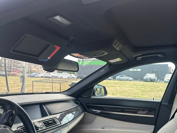 2014 BMW 7 серии 750i xDrive V (F01/F02/F04) Рестайлинг, синий, 2300000 рублей - вид 7