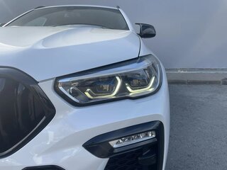 2021 BMW X6 40i III (G06), белый, 8840000 рублей, вид 3