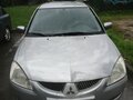 2004 Mitsubishi Lancer IX, серебристый, 200000 рублей