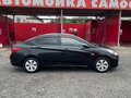 2013 Hyundai Solaris I, чёрный, 410000 рублей - вид 1