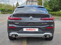 2025 BMW X4 20i II (G02) Рестайлинг, чёрный - вид 3