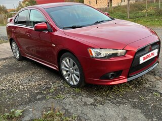 2008 Mitsubishi Lancer X, красный, 950000 рублей, вид 2