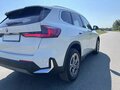 2022 BMW X1 18i sDrive III (U11/U12), белый - вид 4