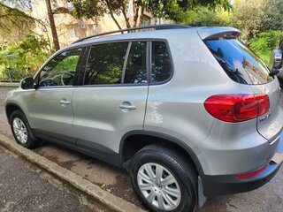 2014 Volkswagen Tiguan I Рестайлинг, серебристый, 1400000 рублей, вид 2