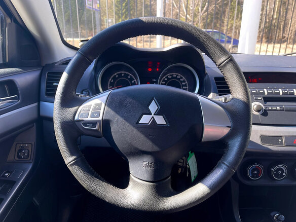 2011 Mitsubishi Lancer X Рестайлинг, серебристый, 629000 рублей - вид 12