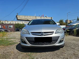 2012 Opel Astra J Рестайлинг, серебристый, 621000 рублей, вид 2