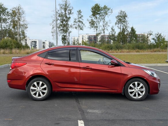 2011 Hyundai Solaris I, красный - вид 5