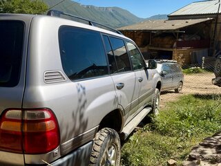 2001 Toyota Land Cruiser 105 100 Series, серебристый, 1900000 рублей, вид 2