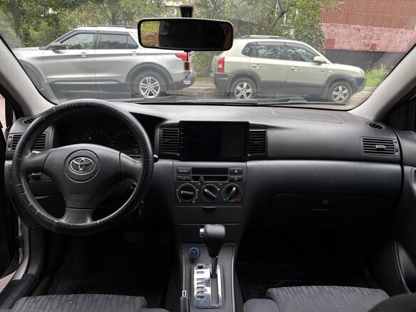 2002 Toyota Corolla IX (E120, E130), серый - вид 7