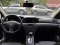 2002 Toyota Corolla IX (E120, E130), серый - вид 7
