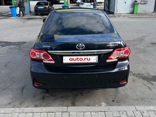 2011 Toyota Corolla X (E140, E150) Рестайлинг, чёрный, 1070000 рублей, вид 4