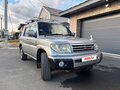 1999 Mitsubishi Pajero iO, серый - вид 1