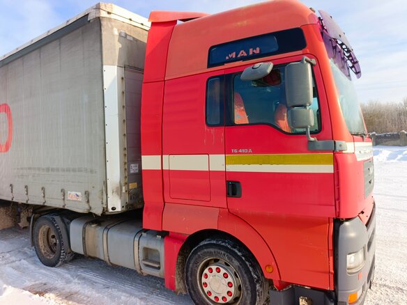 2002 MAN TGA, красный, 2200000 рублей - вид 1