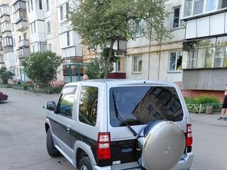 2009 Mitsubishi Pajero Mini II, серебристый, 770000 рублей, вид 4