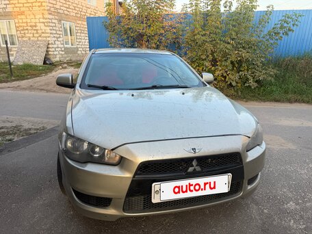 2010 Mitsubishi Lancer X, бежевый, 390000 рублей, вид 1