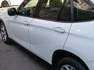 2012 BMW X1 18i I (E84), белый, 1100000 рублей, вид 1