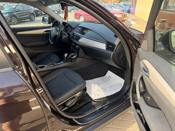 2014 BMW X1 20i I (E84) Рестайлинг, коричневый, 1480000 рублей - вид 18