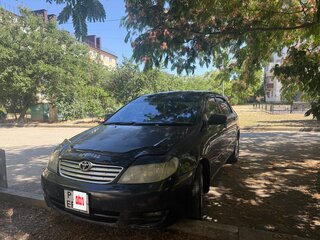 2003 Toyota Corolla IX (E120, E130), чёрный, 385000 рублей, вид 2