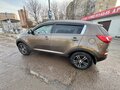 2012 Kia Sportage III, коричневый, 1660000 рублей - вид 3