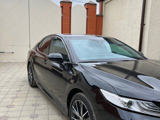 2021 Toyota Camry VIII (XV70) Рестайлинг, чёрный, 3100000 рублей, вид 4
