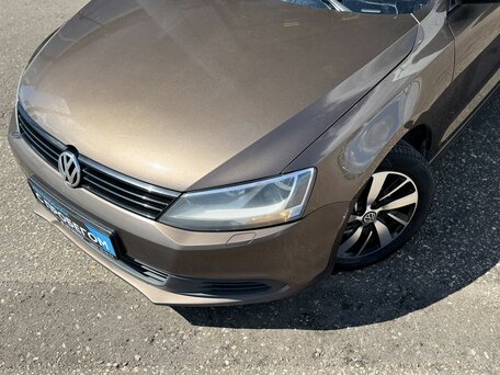 2012 Volkswagen Jetta VI, коричневый, 850000 рублей, вид 2