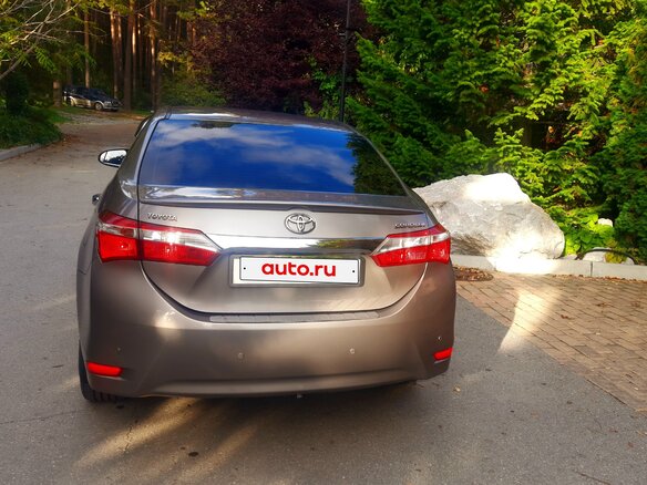 2014 Toyota Corolla XI (E160, E170, E180), золотистый, 1800000 рублей - вид 9