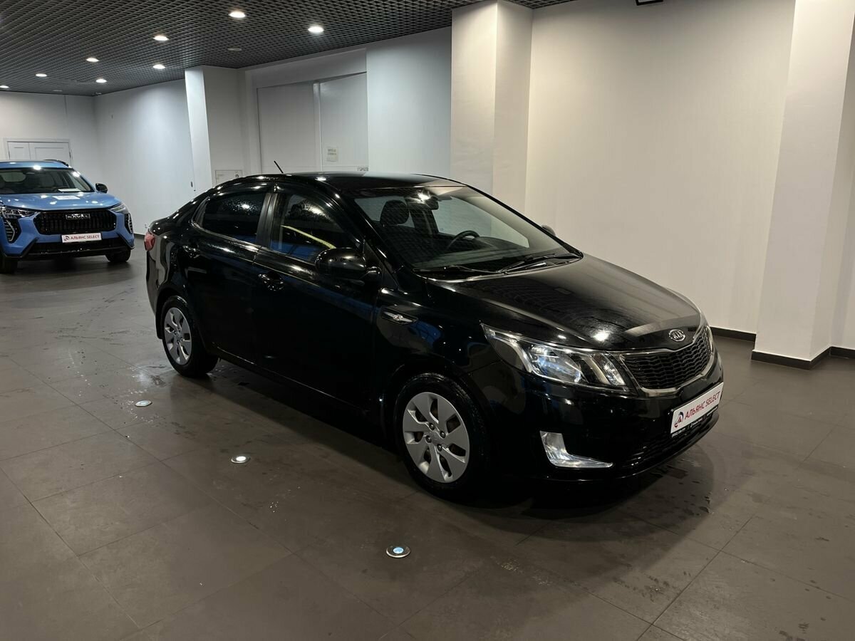 Открыть фотографии: Kia Rio III
