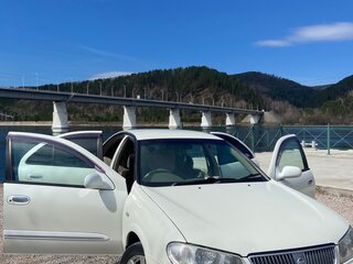 2004 Nissan Bluebird Sylphy I (G10), белый, 580000 рублей, вид 3