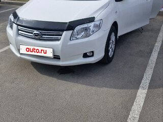 2007 Toyota Corolla Axio X (E140, E150), белый, 670000 рублей, вид 2