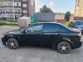 2010 Mitsubishi Lancer X, чёрный, 620000 рублей - вид 3