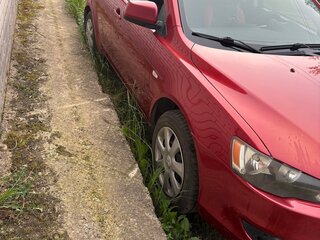 2008 Mitsubishi Lancer X, красный, 750000 рублей, вид 2