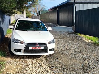 2011 Mitsubishi Lancer X Рестайлинг, белый, 1200000 рублей, вид 2
