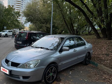 2006 Mitsubishi Lancer IX Рестайлинг, серебристый, 440000 рублей, вид 1